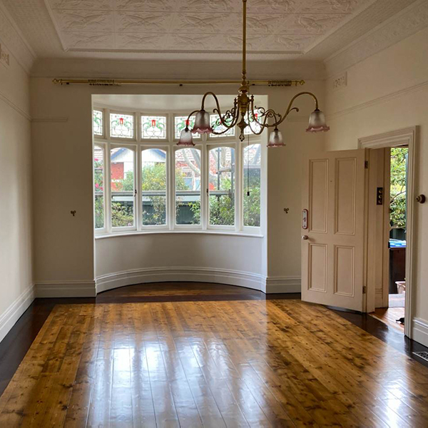 bay windows with polished floor boards