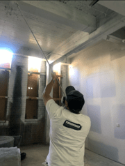 spray-painting ceiling
