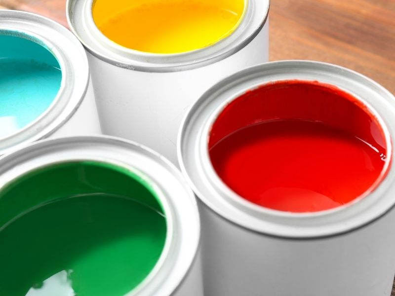tins of colourful paint