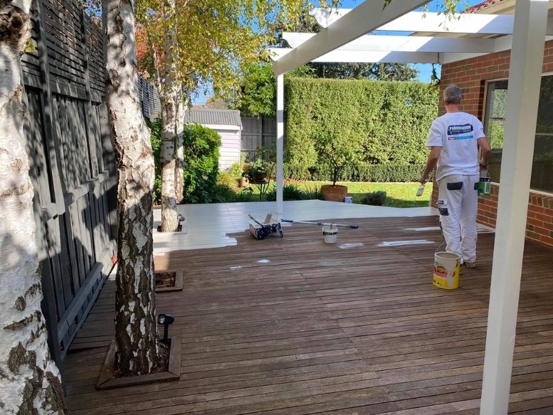 Applying paint to a deck